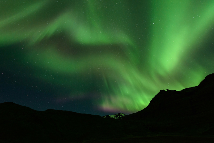 Kirkjufell sous les aurores boréales en Islande